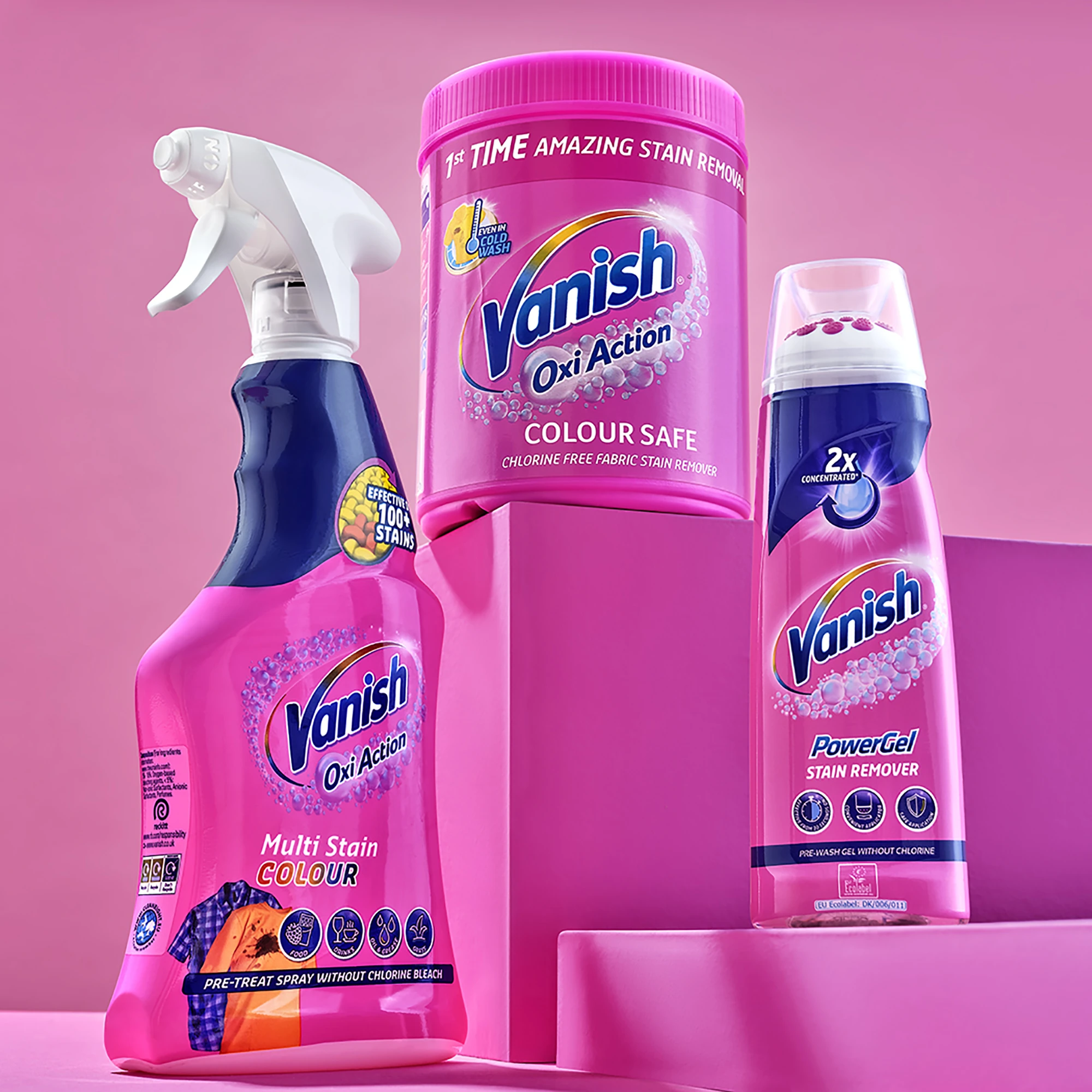 Commercial product photography of Vanish Oxi Action stain remover spray, powder and gel on pink plinths.